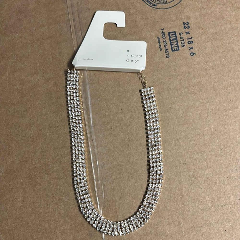 A Nee Day rhinestone necklace